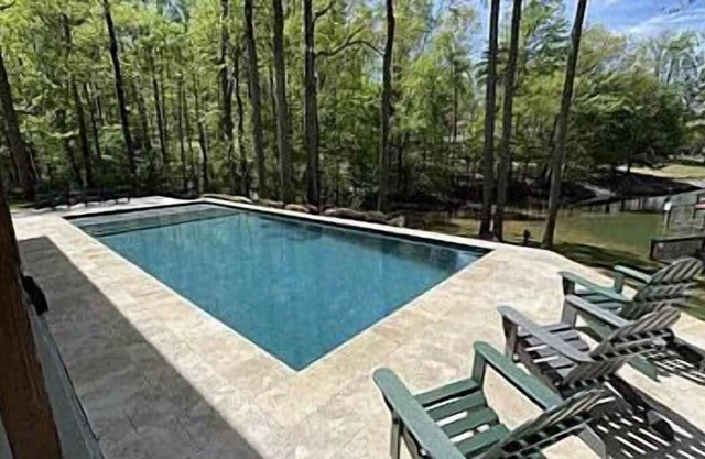 Winding Down | Sleeps 20 | 7 bed/5.5 ba | New pool | Golf Simulator| Pickle Ball Court |