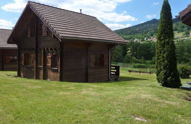 Wooden chalet in Vosges by a pond