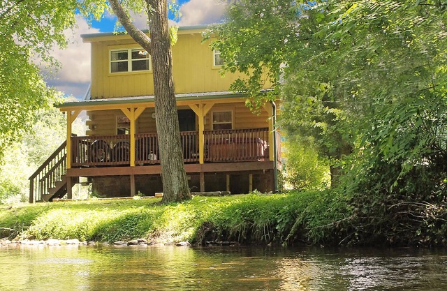 Yellow Cabin on the River by RedAwning