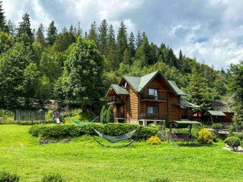 Mykulychyn House | Комплекс котеджів "Під лісом"
