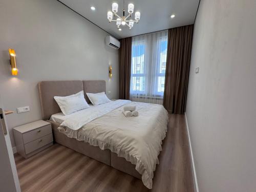 Ulytau District Apartment | Комфортная квартира 1147 возле метро с видом на горы