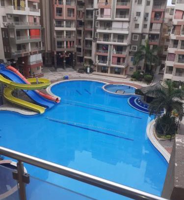 Shurtah al-Dakhlah Apartment | منتجع هوليداى شاطئ النخيل