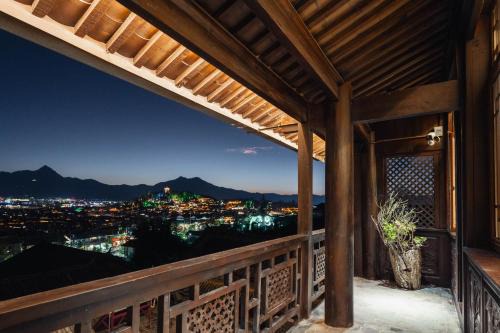 Gucheng Hotel | 丽江见山庐观景花园民宿