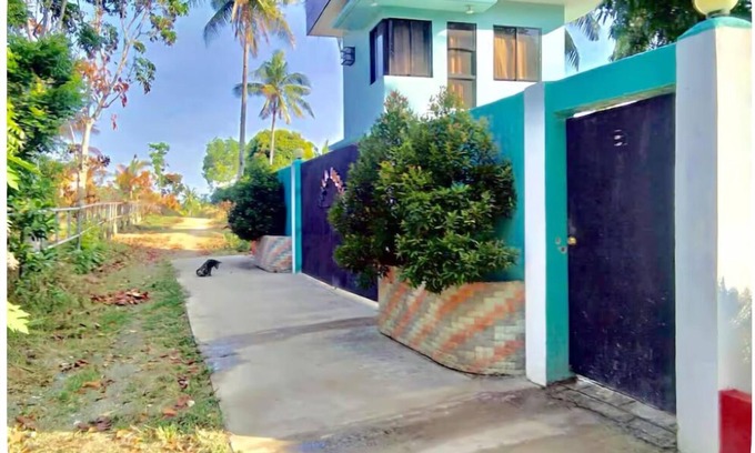 San Remigio Bed & Breakfast | 1 Bed with full bath AC, Rooftop and walking distance to beach