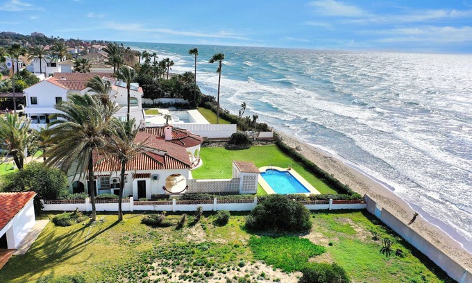 Urbanizacion Marbessa Villa | 1100 Stunning Marbesa Beachfront Villa with Garden Pool