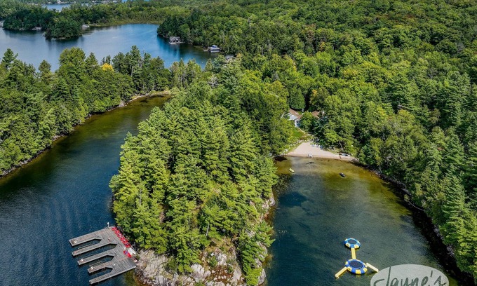 Muskoka Lakes Cottage | 1300' of Ultra Private Frontage! 3bed 2bath! Waterfall! Tennis Court!