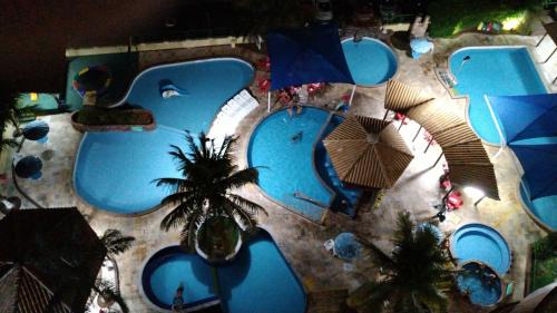 J Jeriquara Apartment | 1406 AP 2 Quartos, Banheira de Hidro privativa , bebidas liberadas nas piscinas e internet no ap, proximo ao shopping singapura