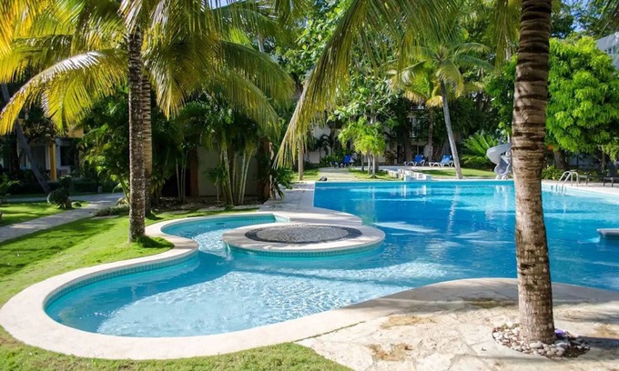 La Esplanada Apartment | 1BR/1BA Beachside condo: Savor poolside living with parking included