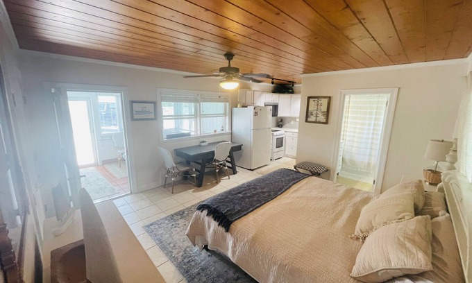 Emerald Isle House | 1BR beach getaway: pool, pier, sunset views. Full amenities. Near beach access.