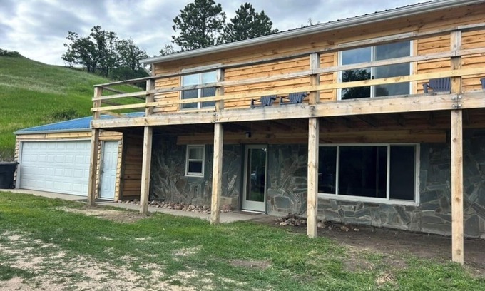 Sturgis Cabin | 2-bedroom, 1 bathroom log cabin Bottom floor offers the perfect retreat close to downtown Sturgis. With breathtaking views and a peaceful wooded setting, this cozy home-away-from-home. Comfortably accommodating up to 6 guests.