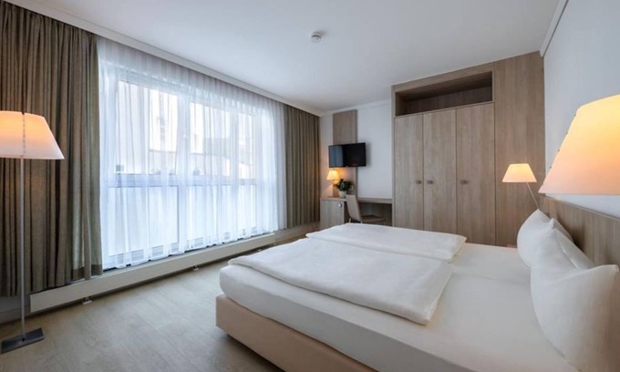 Norderney House | 2-room app. (up to 3 pers.), bed & breakfast. - Michels Strandhotel Germania