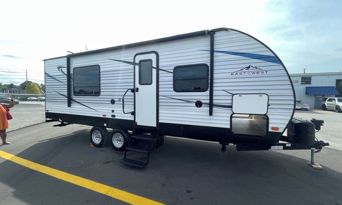 Brampton House | 2019 East to West Della Terra 25 Foot Travel Trailer on a rural property