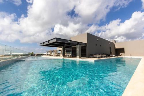 Zazil-ha Apartment | 2022 Modern Condo Steps to the Ocean w/Hot Tub