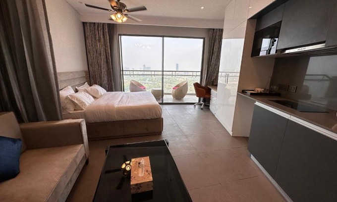 Noida Apartment | 21st Floor SkyStudio Suite with Balcony