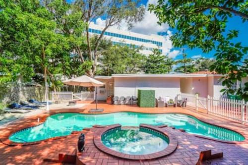 Northeast Coconut Grove House | 2710 · Heated Pool 7 Beds 5 Baths Sleep 15 Park 4 Car