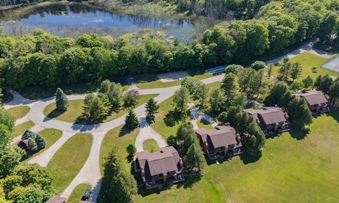 Baileys Harbor Condo | 2BR Condo with Fireplace, Balcony, & Lakefront Access at The Rushes