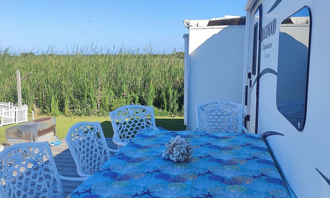 North Topsail Beach House | 35 ft RV, large deck, intercoastal sunset, campground across street from ocean