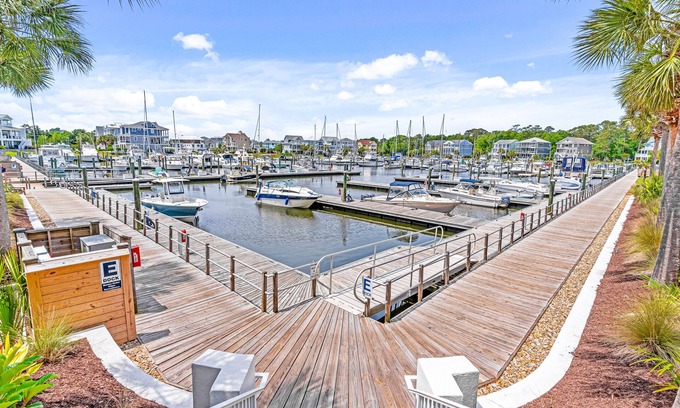 St. James Condo | 3rd-floor condo with marina & Intercoastal Waterway views, porch, W/D, & AC