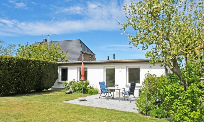 Gager Apartment | 4 - star vacation home Am Brink with garden and sea view
