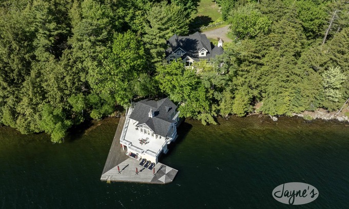 Port Carling Cottage | 6 bed 6 bath cottage on Lake Joseph with SW Exposure! Boathouse with upper deck!