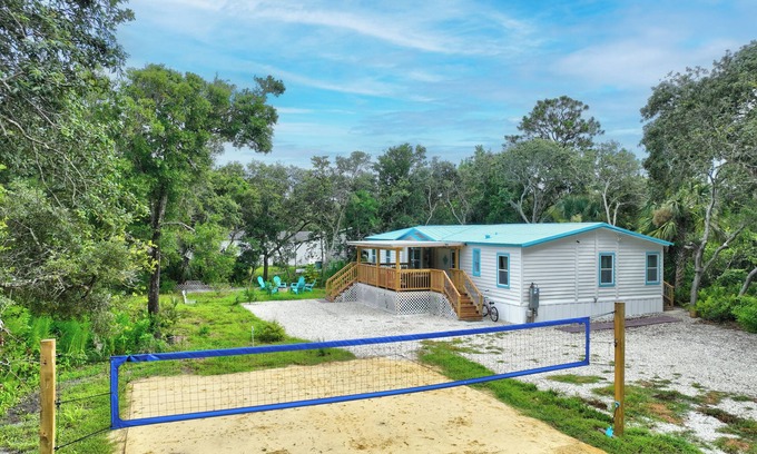 Palm Coast House | 7 minutes to the beach! House for short term rent with its own volleyball court!