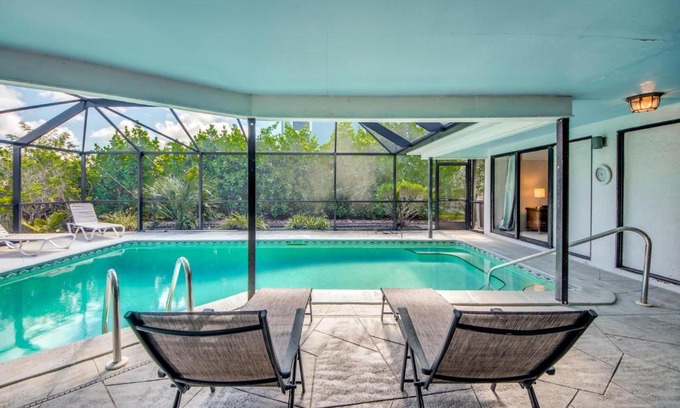 Laguna Shores House | 8305 Estero Boulevard - Large beach home with screened-in lanai area & pool!