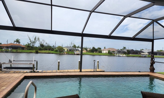 South Gulf Cove House | A 100+ reviews Family friendly home on canal with gulf access and heated pool!