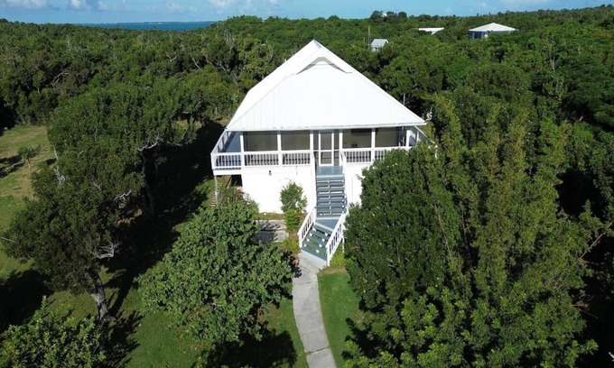 Hope Town House | A boater's dream home with a private dock UP THE CREEK from Hope Town Harbor.
