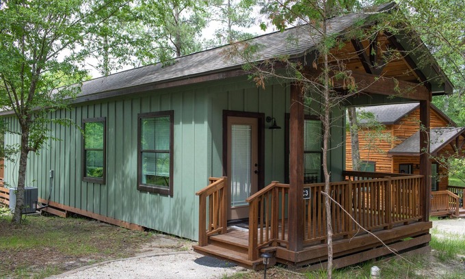 Livingston Cabin | A Cozy Getaway Right on the Water, Two Creeks Crossing Resort