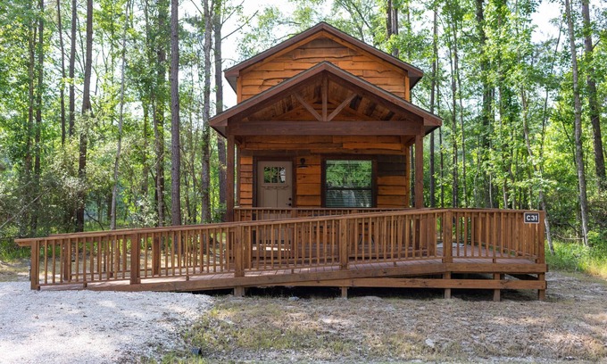 Livingston Cabin | A cozy little ADA accessible getaway right on Kickapoo Creek. Two Creeks Crossing Resort
