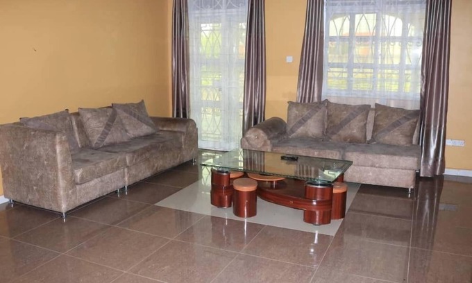 Fort Portal House | A & J Holiday Suites