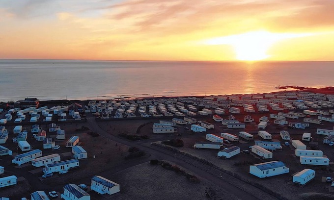 Cresswell House | A modern holiday home with one master double and two twin bedrooms.