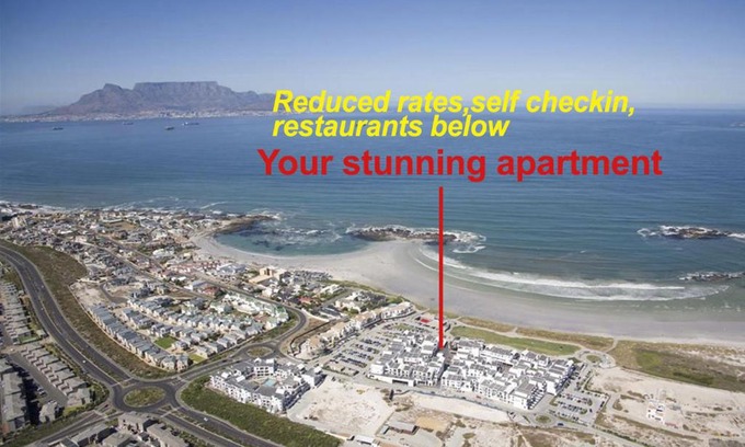 Big Bay Apartment | A Modern unit, self checkin, restaurants and shops below