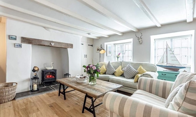 Malborough Cottage | A renovated 300 year old Thatched cottage in the heart of a pretty village.