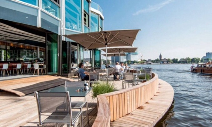 Amsterdam East Boat Rental | A romantic and unique design house boat on the Amstel river in Amsterdam