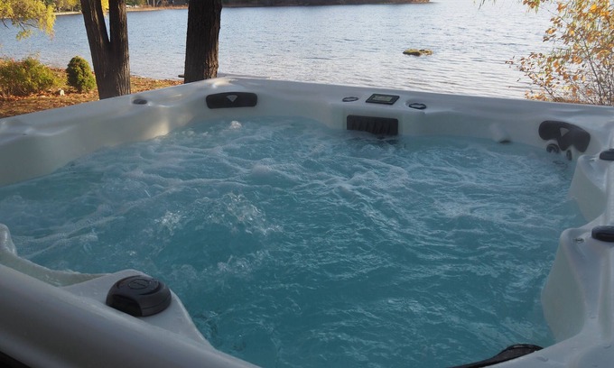 Elk Rapids Cottage | A Short's Walk - Sandy Lakefront with Spa/Hot Tub and Kayaks!