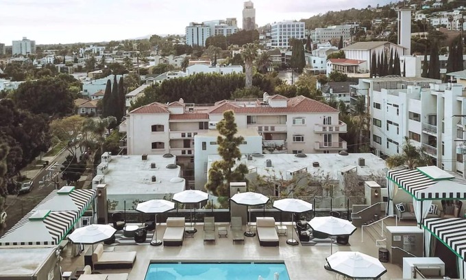 Norma Triangle Hotel | A Sophisticated Suite, Three Units with Furnished Living and Sleeping Space!