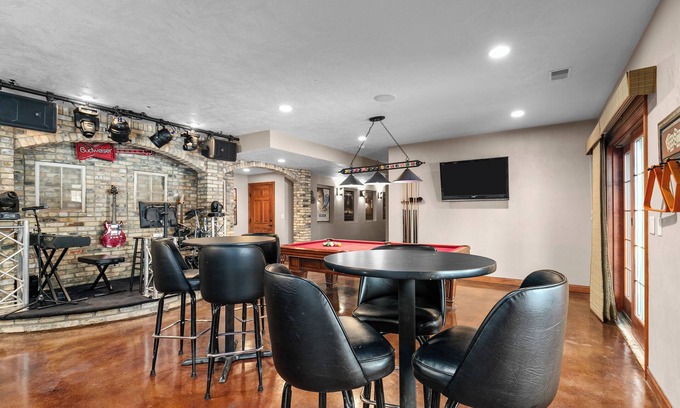 Forest Junction House | A warm & inviting modern retreat featuring on-site local brews & a home theater.