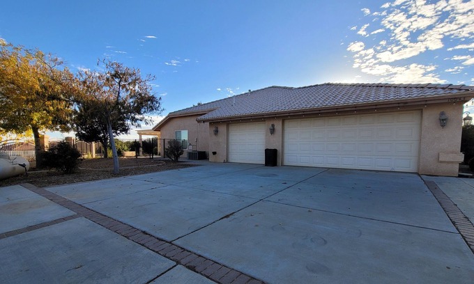 Hesperia House | A well designed and gated home with panoramic views that is pet friendly.