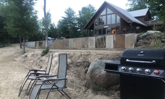 Lawrenceville House | Adirondack river house with a new pavilion seats 50 constructed fall of 2025