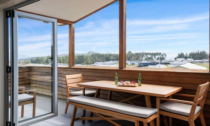 Motuoapa House | Adventure Sika - Relax on the deck with views