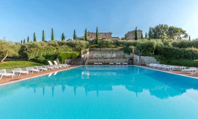 Asciano Apartment | AffittiBreviSiena - Palazzo Monaci Appartamento con piscina nelle crete Senesi