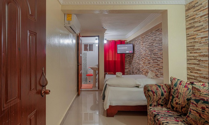 Corales del Sur Apartment | Air conditioned Single Room with Fridge in Corales del Sur, Santo Domingo Este