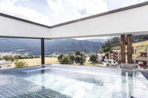 Curon Venosta Hotel | Aktiv- und Wellnesshotel Traube- Post