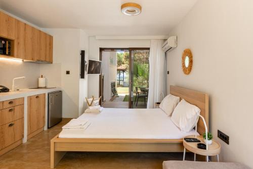 Kontos House | Alkis Guest House by AegianKazarte
