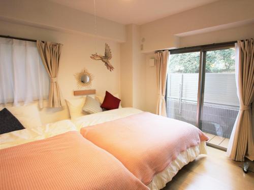 Hiroshima City Centre Apartment | Alphabed広島平和大通り
