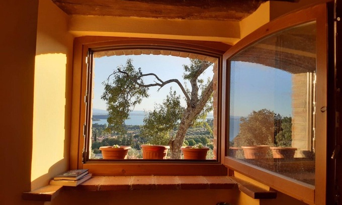 Passignano sul Trasimeno House | Amazing Lake view old house