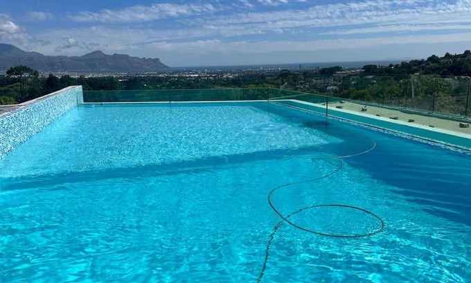 Somerset West Villa | Amazing! 7 bedroom villa with rooftop pool & views