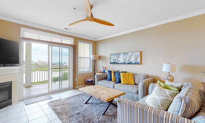Sunset Island Condo | Amazing Family Condo w/AC, Private W/D, Shared Pool, Free WiFi, & Bay Views