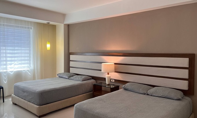 Alfredo V. Bonfil Apartment | Amplia habitación doble a 5 minutos del aeropuerto